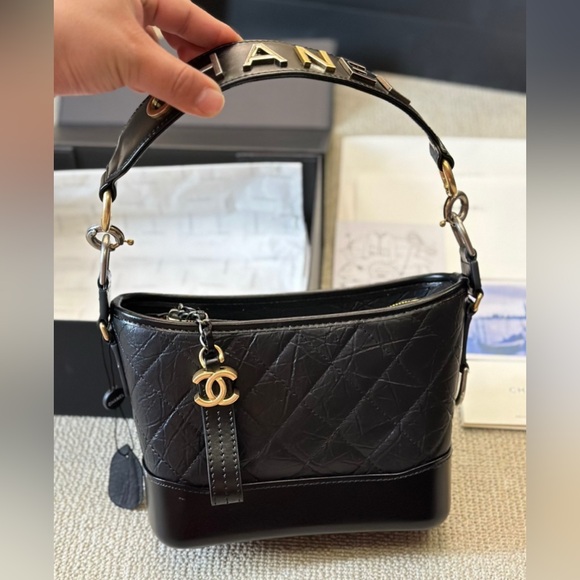 Chanel Gabrielle small model handbag in black quilted leather - Picture 5 of 9